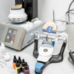 Professional oven with artificial jaw, baking enamel dentures at the laboratory